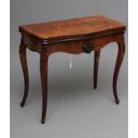 A FRENCH ROSEWOOD FOLDING CARD TABLE, 19th century, of serpentine oblong form, the moulded edged top