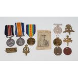 TWO FAMILIES OF FIRST WORLD WAR MEDALS, the first awarded to Private W. Jarmin of The Royal Army