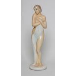 AN ITALIAN RONZAN EARTHENWARE FIGURE, 1960's, of a young female nude holding up a pale blue towel,