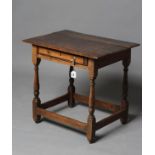 A SMALL JOINED OAK SIDE TABLE, basically early 18th century, the oblong moulded edged plank top over