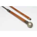 A ROYAL GUERNSEY LIGHT INFANTRY SWORD CANE with 14 3/8" square section blade, bamboo shaft and