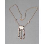 AN EDWARDIAN NECKLACE centred by a collet set mother of pearl panel pendant with three chains set