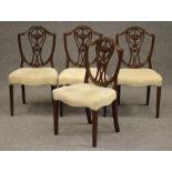 A SET OF FOUR MAHOGANY HEPPLEWHITE STYLE DINING CHAIRS, 19th century, upholstered in an ivory weave,