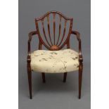 A GEORGIAN MAHOGANY AND INLAID ELBOW CHAIR, third quarter 18th century, the shield back inlaid