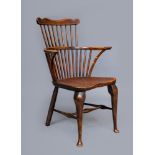 AN ASH AND ELM COMB BACK WINDSOR ARMCHAIR, probably Thames Valley, late 18th century, with waved and