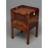 A GEORGIAN MAHOGANY NIGHT COMMODE, late 18th century, the tray top with pierced handles, the