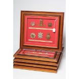 FIVE FRAMED DISPLAYS OF BRITISH MILITARY CAP BADGES, the thirty eight badges include Irish
