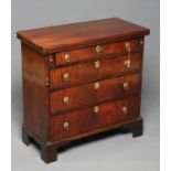 A GEORGIAN MAHOGANY BACHELOR'S CHEST, mid 18th century, the moulded edged rounded oblong folding top