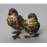 A SMALL COLD PAINTED VIENNA BRONZE OF TWO CHICKS, c.1900, very indistinctly marked, 1 3/4" high (