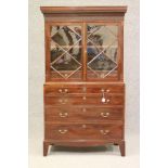 A MAHOGANY SECRETAIRE BOOKCASE, late 18th century and later, the dentil moulded cornice over blind