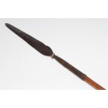 A ZULU IKLWA OR STABBING SPEAR, late 19th century, with 13" leaf blade, hide collar and