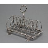 A WILLIAM IV SILVER SEVEN BAR WIREWORK TOASTRACK, maker J. Settle & H. Williamson, Sheffield 1830,