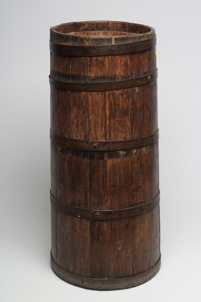 A COOPERED OAK AND IRON BANDED STICK STAND, 19th century, of tapering circular form, 11 1/4" x