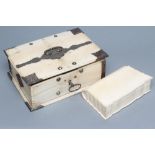 AN IVORY OBLONG BOX, probably Indian 19th century, with stamped and pierced metal spandrels and