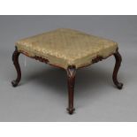 A VICTORIAN CARVED MAHOGANY DRESSING STOOL of oblong form upholstered in pale green silk damask,