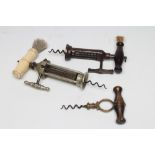 A KINGS TYPE STEEL BARREL CORKSCREW, 19th century, the turned bone handle with brush, 8" wide,