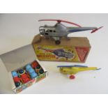 Tudor Rose friction helicopter, plastic helicopter and a box of twelve friction plastic robots, F-