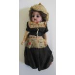 A Kammer & Reinhardt dolls house doll, with bisque socket head, brown glass sleeping eyes, open