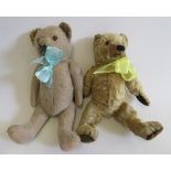 Two pre-war teddy bears, both with amber eyes and sewn nose and mouths, the turquoise bowed bear