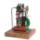 A single cylinder steam engine fitted with displacement lubricator, cylinder drain cocks, on