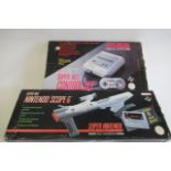 Super Nintendo Game System PAL Version with Super NES Scope 6, both items boxed, G-E. These products