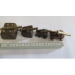 Four antique miniature brass cannons affixed to wooden bases, F (Est. plus 21% premium inc. VAT)