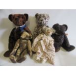 Five modern collectors bears, comprising a 29" Paula Bears brown bear, an 18 1/4" Paula Bears