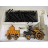 A Hornby 3 1/2" gauge live steam Stephenson's Rocket, boxed with track, F (Est. plus 21% premium