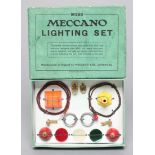 Meccano Lighting Set, boxed, strung onto card, G-E, and a Meccano Guild badge (Est. plus 21% premium