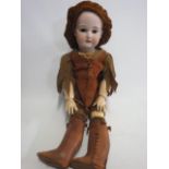 A large Armand Marseille bisque socket head doll, with brown glass sleeping eyes, open mouth with