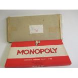 A 1970's Monopoly board game, boxed, with outer sleeve, E (Est. plus 21% premium inc. VAT)
