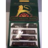Hornby Train Pack with A4 Guillemot and three B.R. coaches, box AF-E, a playworn lineside building