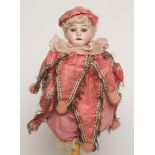An Armand Marseille bisque shoulder head marotte doll, with light blue eyes, open mouth and teeth,