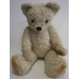 A large vintage teddy bear bag, with glass amber eyes with felt backing, re-sewn nose and mouth,