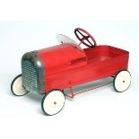 A Triang type pedal car finished in red with white wheels, some rusting and over painting, F (Est.