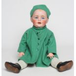 A J.D.Kestner bisque socket head doll, with blue glass sleeping eyes, open mouth, teeth and fixed