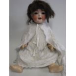 A Heubach Koppelsdorf bisque socket head character doll, with blue glass sleeping eyes, open