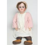 A Simon & Halbig "Jutta" bisque socket head doll, with blue paperweight sleeping eyes, open mouth