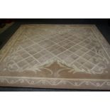 A CHINESE STYLE DEEP PILE CARPET in two tone champagne, cut pattern trellis centre within a