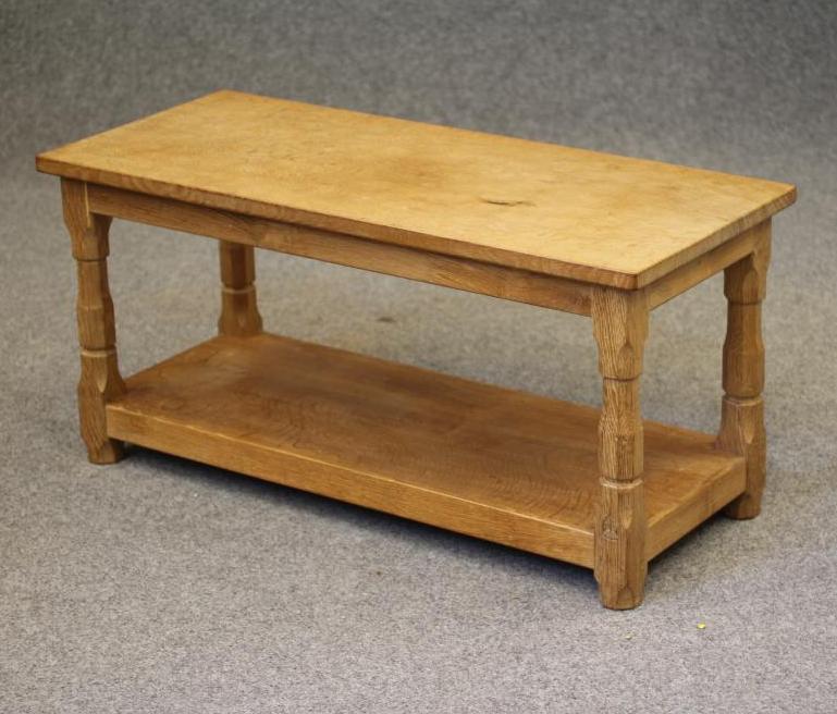 A HORACE KNIGHT (BALK) ADZED OAK COFFEE TABLE, the rounded oblong top and plain frieze raised on