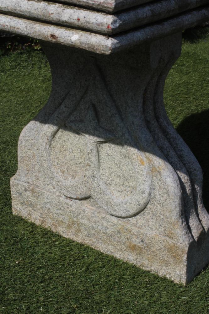 A GRANITE BENCH, the moulded edged oblong seat on shaped end supports each with a heart motif, - Bild 3 aus 4