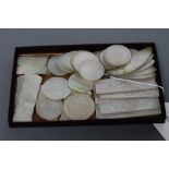 A COLLECTION OF CHINESE MOTHER OF PEARL GAMING COUNTERS including six oblong with a coat of arms and