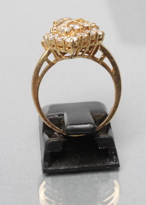 A DIAMOND COCKTAIL RING, the leaf shaped panel variously set with baguette and brilliant cut - Image 3 of 3