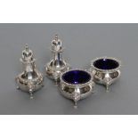 A SILVER FOUR PIECE CRUET, maker Fowler & Polglaze Ltd., London 1933 (one salt) and 1934, in