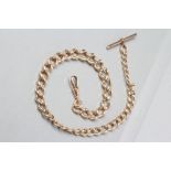 A GRADUATING CURB LINK ALBERT CHAIN, the dog clip fastener stamped 9, 375, links unmarked, plated