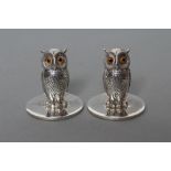 A PAIR OF SILVER NOVELTY MENU/PLACE CARD HOLDERS, maker Sampson Morden, Chester 1913, cast as owls