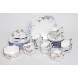 AN ART DECO SHELLEY CHINA QUEEN ANN TEA SERVICE printed and painted with the Lupin pattern,