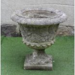 A FRENCH COMPOSITION URN, the tapering bowl moulded with trailing vine and with everted rim,