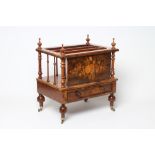 A VICTORIAN WALNUT CANTERBURY of oblong form with turned finials and floral marquetry front panel,