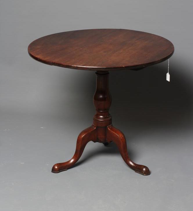 A GEORGIAN MAHOGANY TRIPOD TABLE, late 18th century, with circular snap top and turned baluster